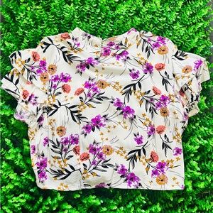 Beautiful blouse with a detail on the back. Used once. Zipper works perfect.